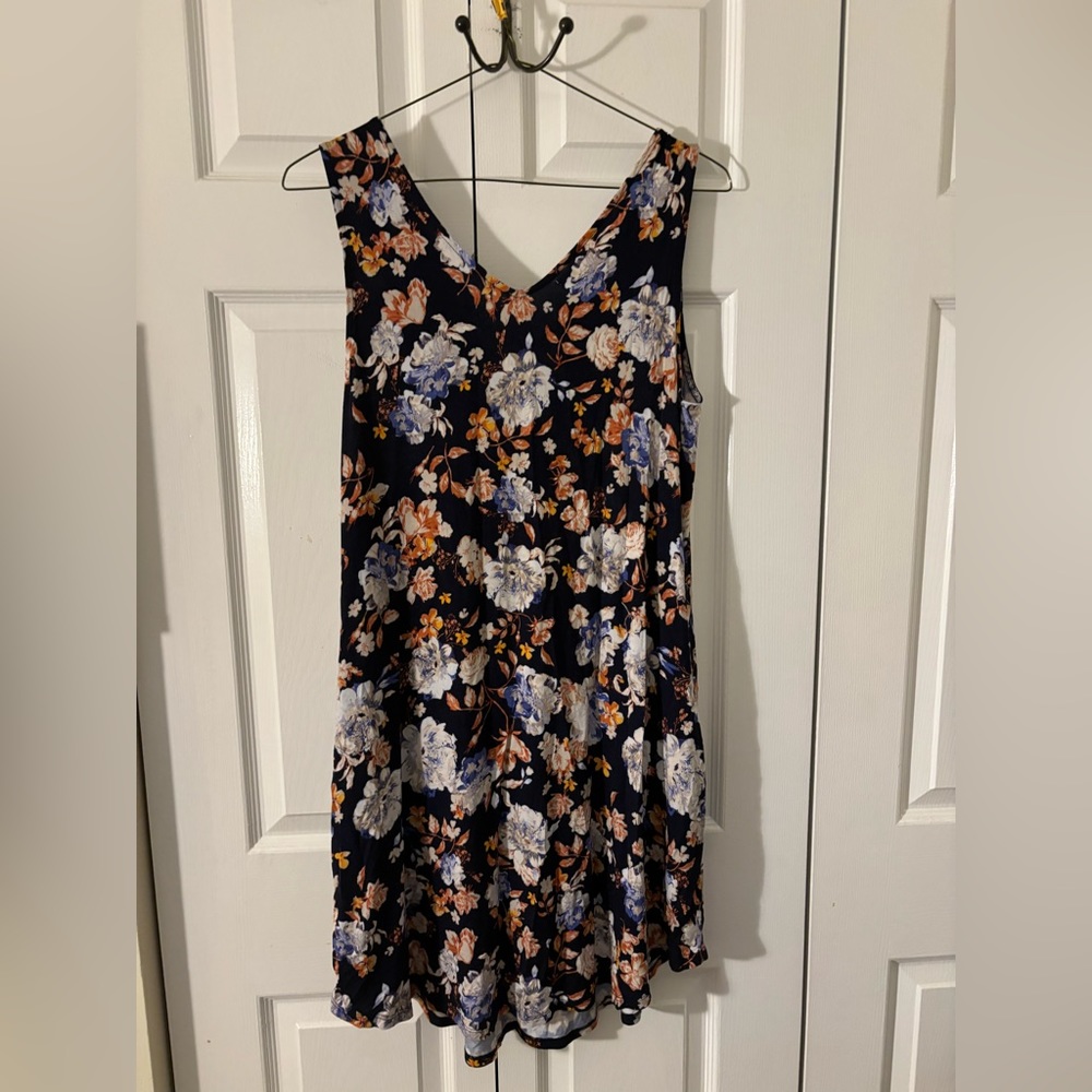 Dark blue dress with flower pattern.